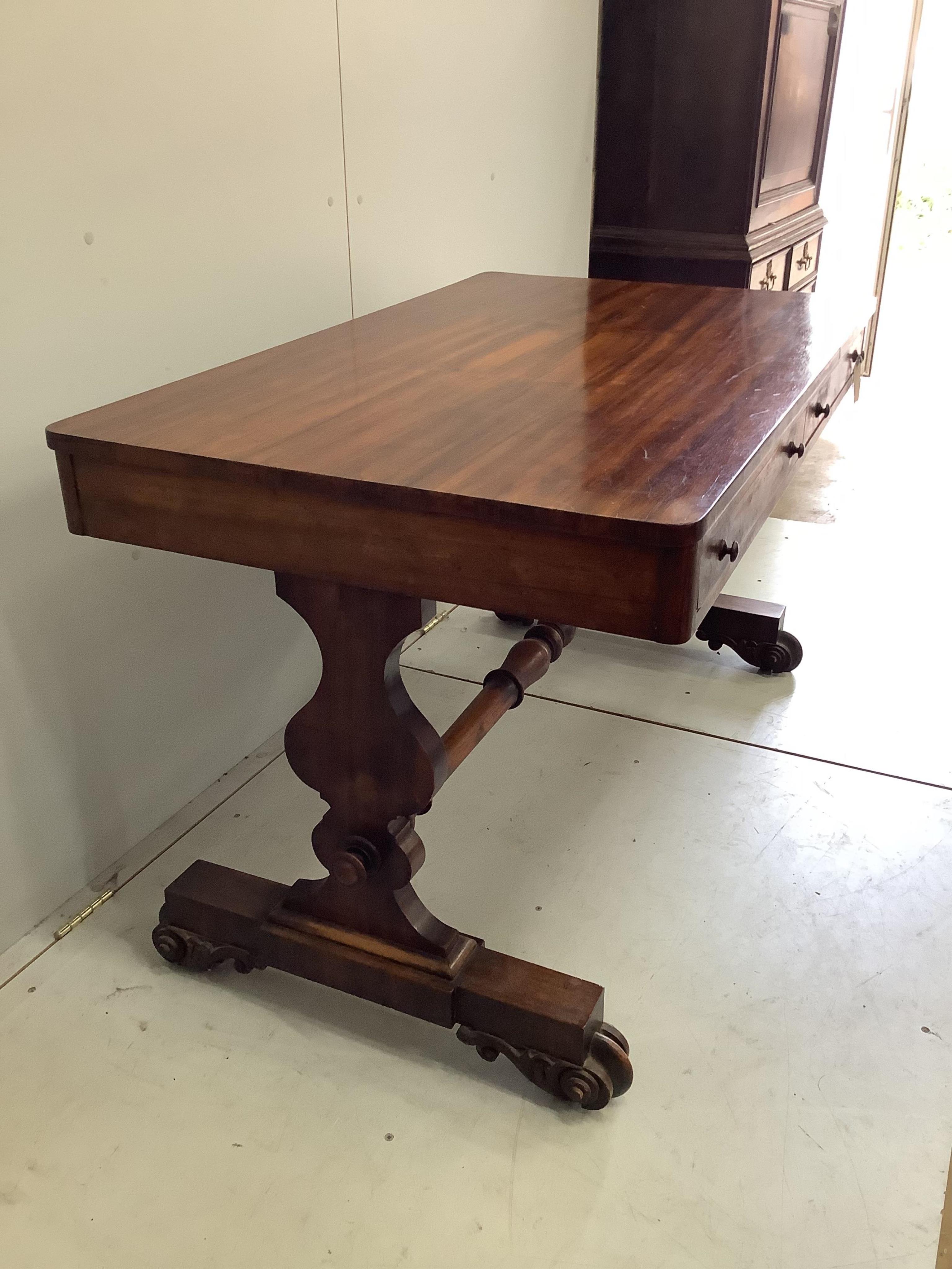 A Regency rosewood library table, width 125cm, depth 75cm, height 74cm. Condition - fair